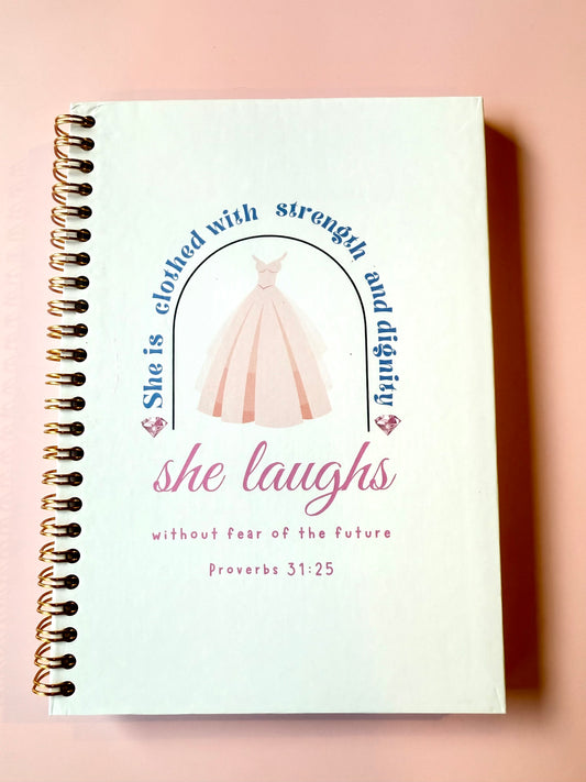 She is Clothed ( Proverbs 31:25) Spiral Christian Notebook
